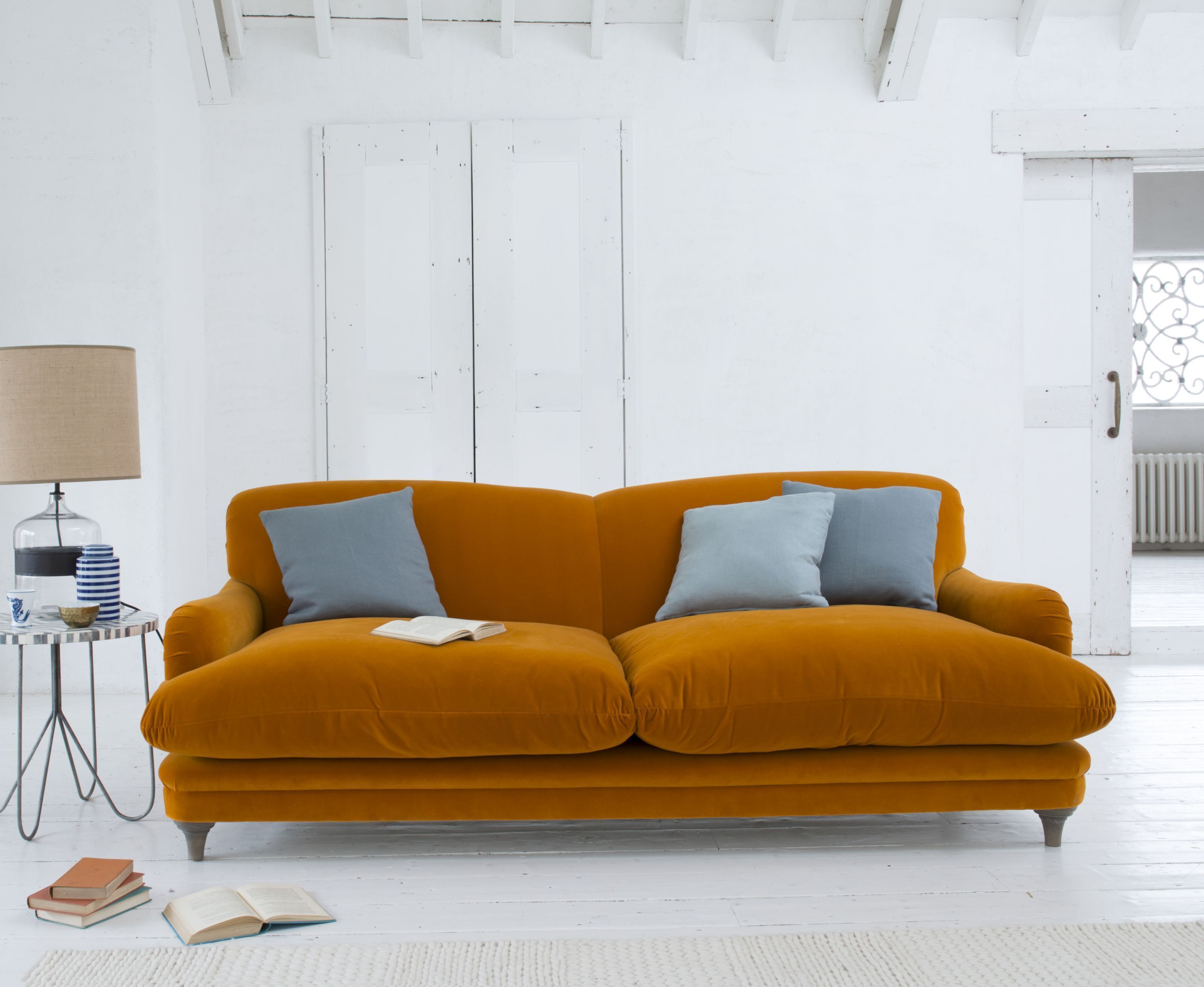 Pudding sofa, in burnt orange plush velvet, from £1,195, Loaf